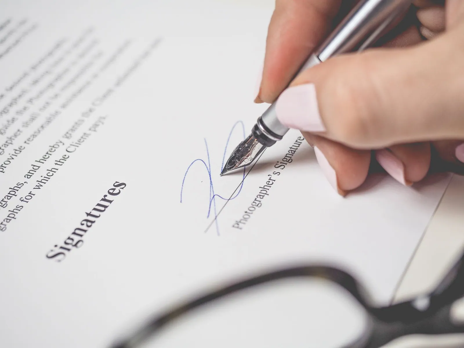 A coaching agreement being signed